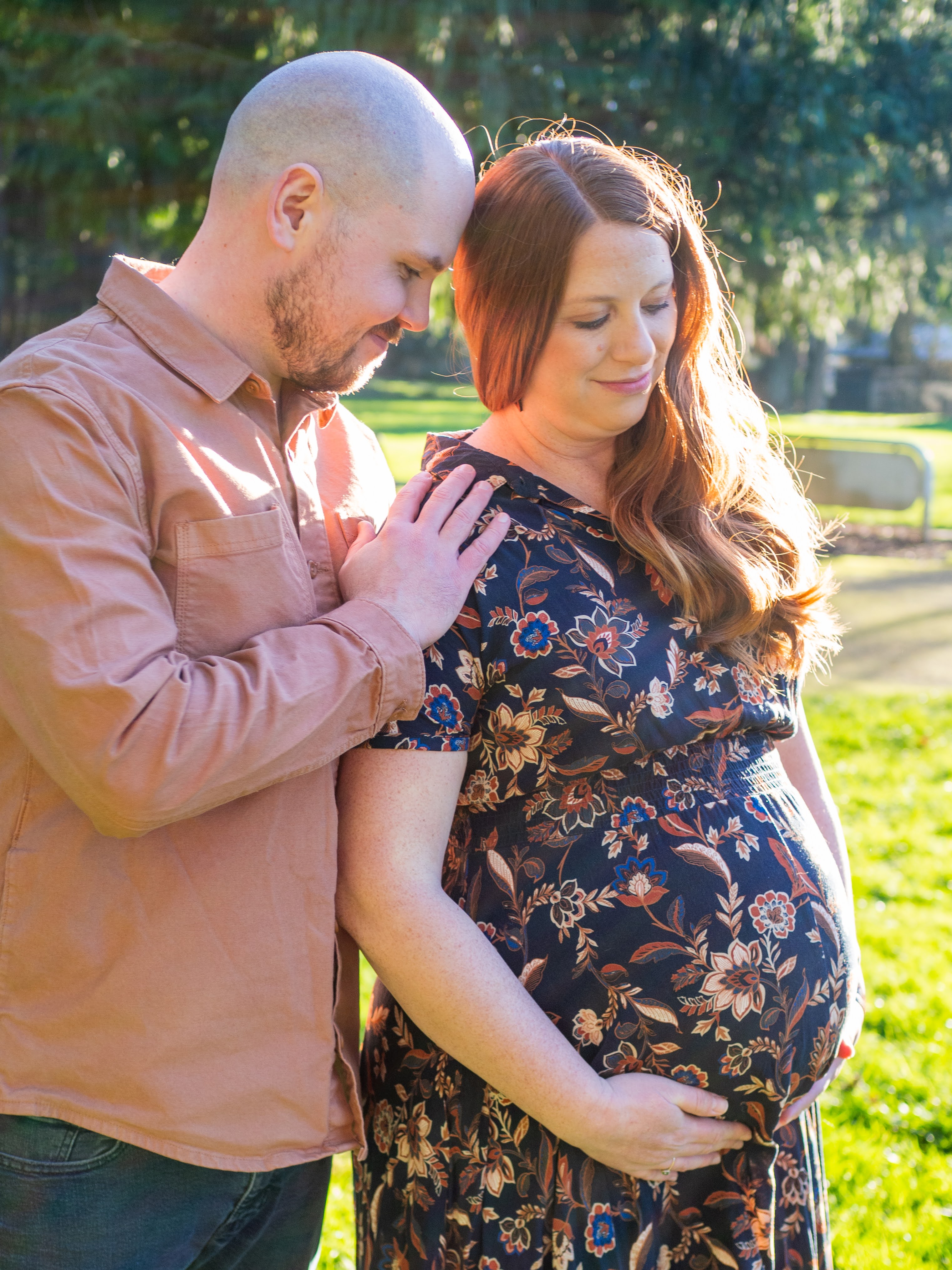 Sarah and Phil sharing a moment during their maternity session