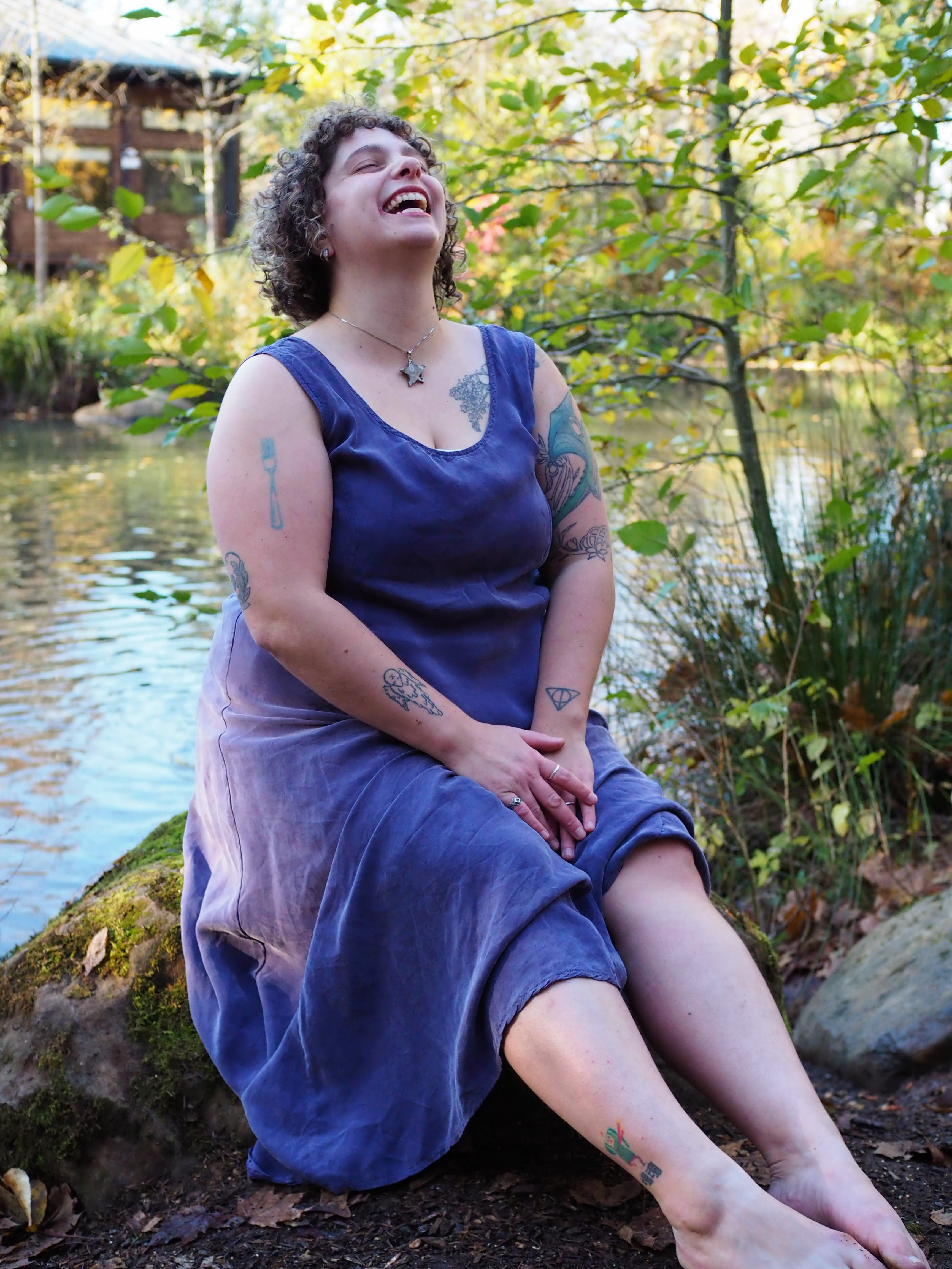 Sasha laughing during an outdoor portrait session